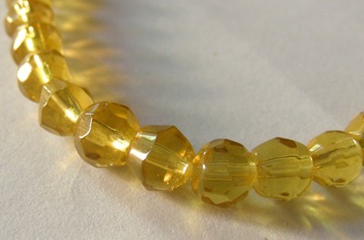 6mm Facetted Glass Round - Light Amber (+/-52 pieces)