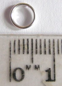 7mm Silvertone Split Rings (+/- 500 pieces)